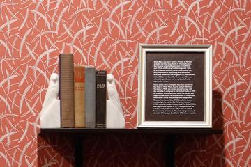 Artwork and books from Café Vienne exhibit