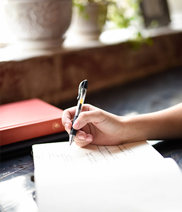 Writing in book