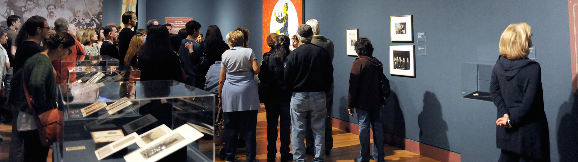 People on a tour in an exhibitiion gallery