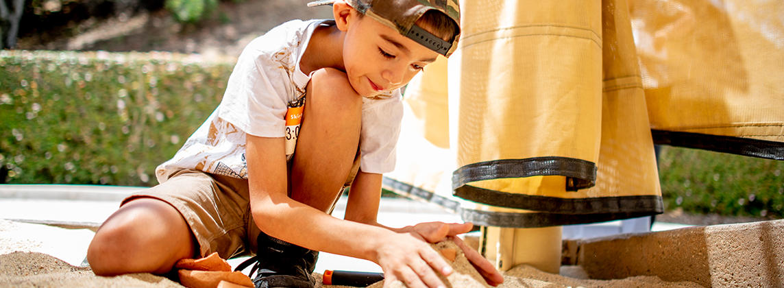 Child in Archaeology Dig