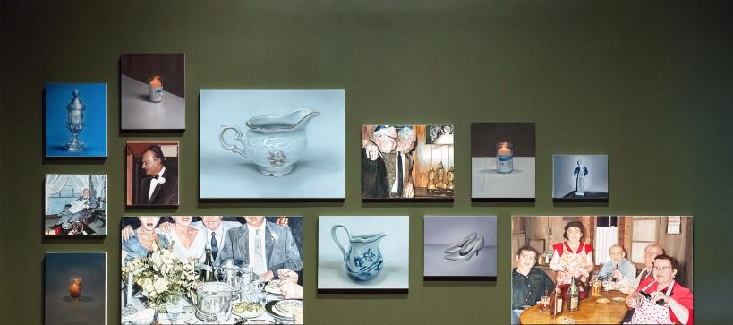 A group of painting hung together in a gallery featuring everyday life and objects.