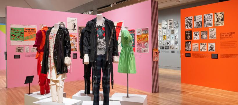 A gallery featuring colorful punk poster and clothing.