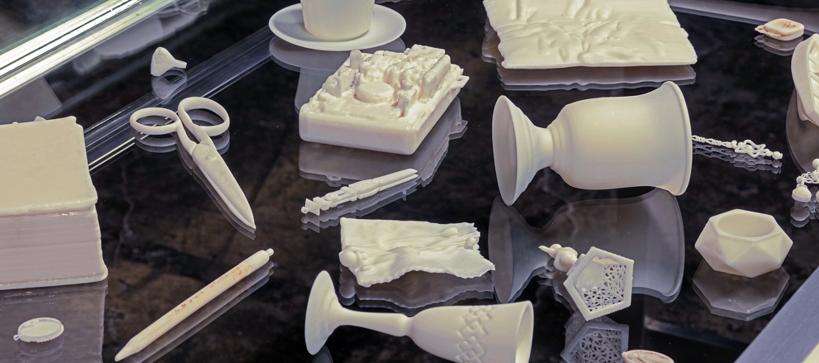Everyday objects made of white resin like cups and scissors