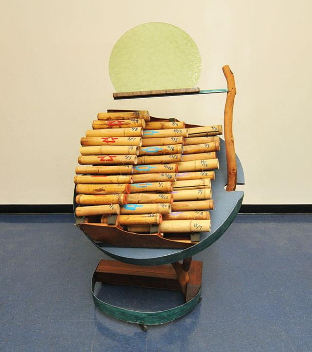Photo of a sculptural instrument made from bamboo pieces