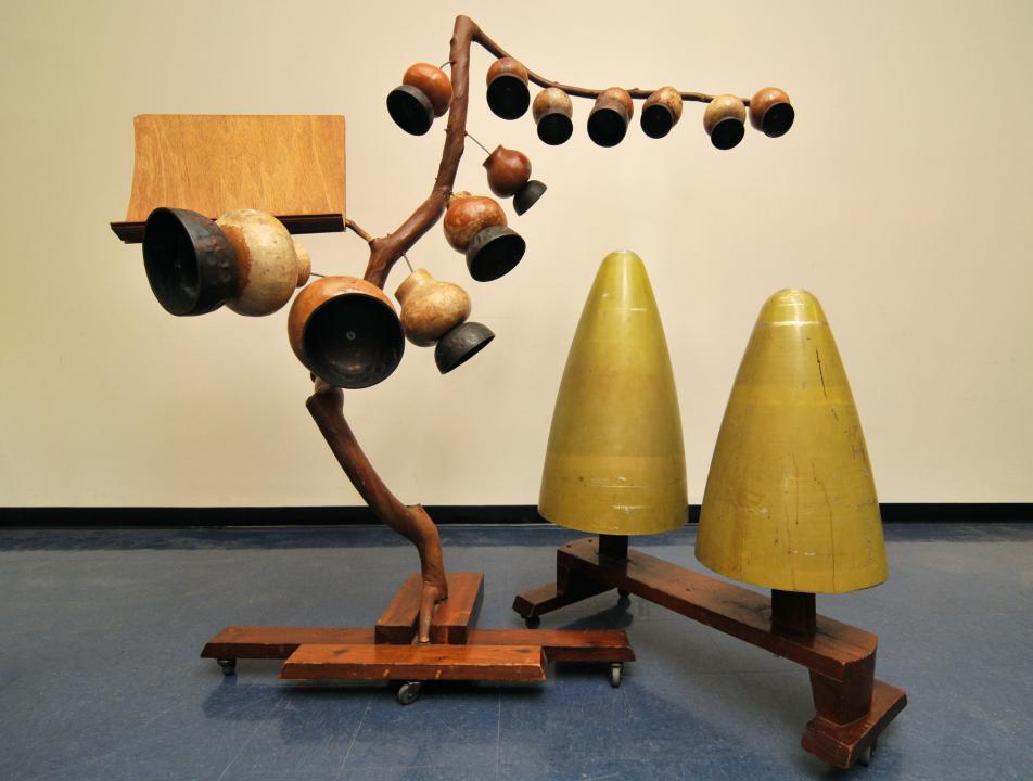 Photo of a sculptural instrument made from gourds and cones