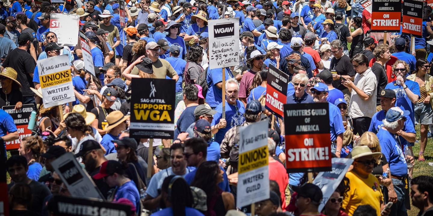 A swarm of picketers take part in the WGA strike on June 21, 2023