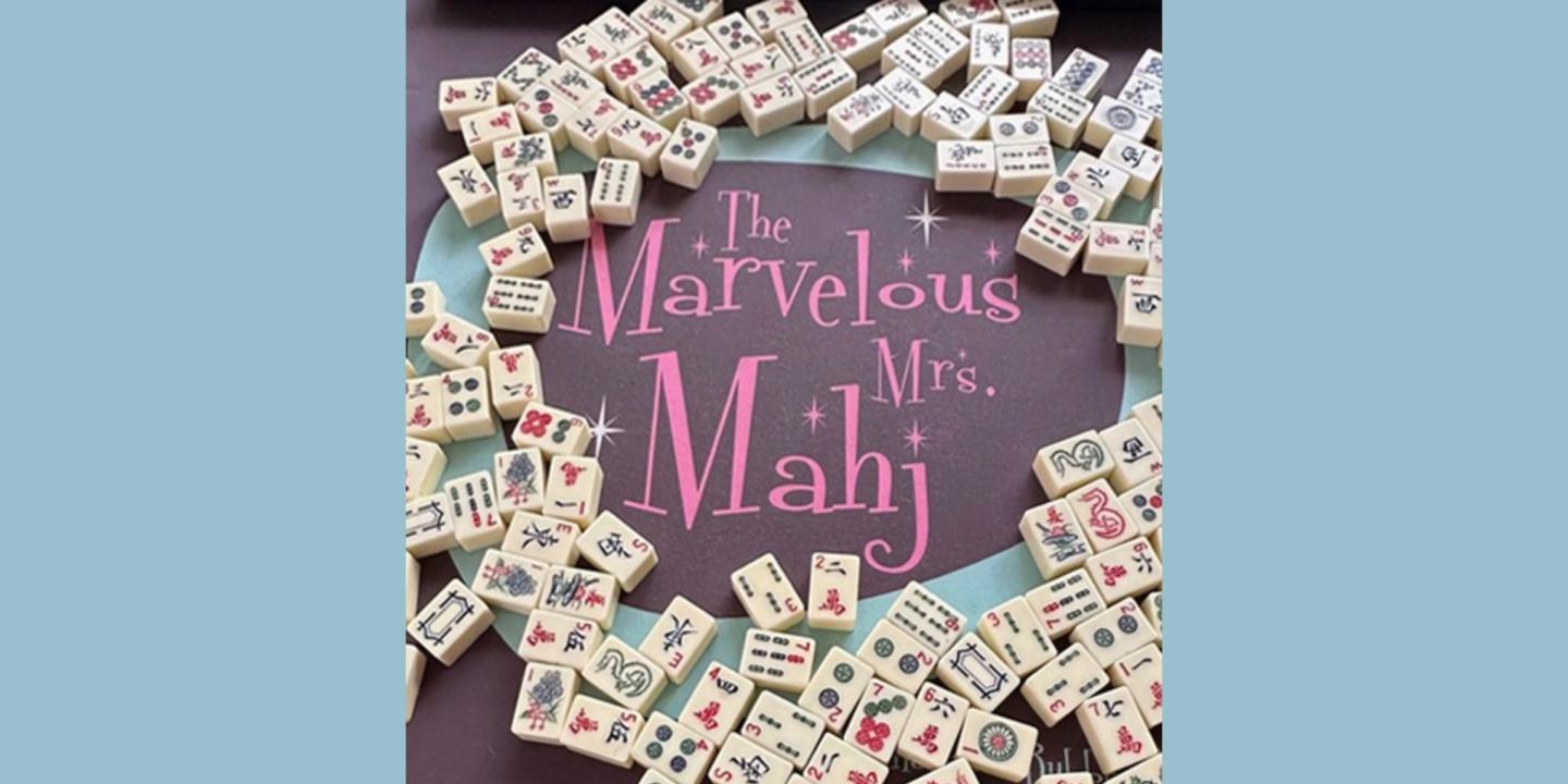 The words, The Marvelous Mrs. Mahj appear in pink, funky letters on a black table surrounded by mahjong tiles.