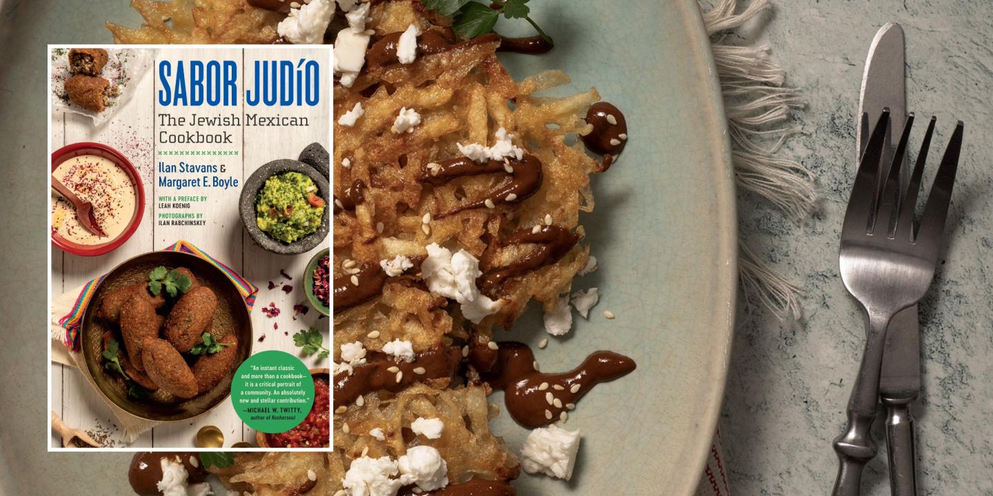 Cover of the book, Sabor Judio, The Jewish Mexican Cookbook, over a photo of a plated dish.