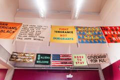 group of protest banners on fabric rectangles 