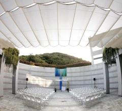 Founders Courtyard with rows of chairs and a chuppah