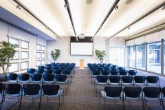 Haas Conference Center showing chair arranged in rows facing a projection screen