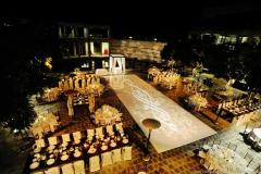 Taper Courtyard view from above with dramatic night-time lighting