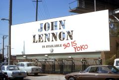 billboard for John Lennon that reads 'John Lennon is available' and in stylized spray paint 'so is Yoko'