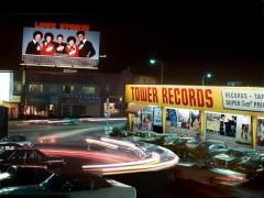 billboard for Tavares: Love Storm across the street from Tower Records