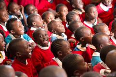 a group of young students smiling and laughing