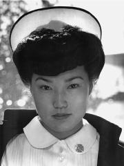 headshot of a woman in nurse uniform