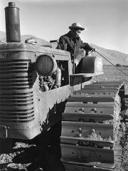 a man sitting on a tractor