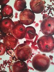 image of pomegranates and pomegranate seeds