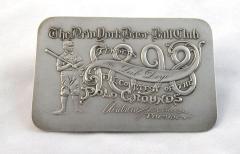 metal rectangle with low-relief baseball player and '1898' 