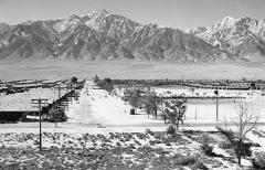 view of barracks and mountains in distance