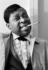 B. B. King with a cigar in his mouth
