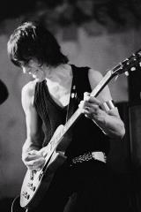 Jeff Beck playing a guitar