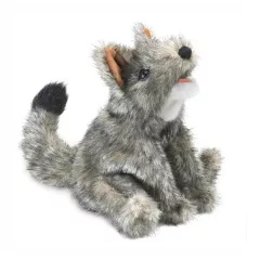 A small furry grey stuffed animal of a wolf.