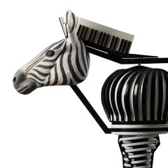 A zebra made of wood and a keyboard