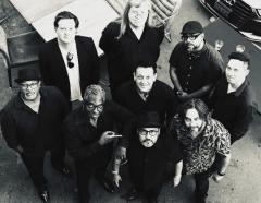 black-and-white photo looking down at a group of people