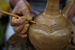 A hand crafts Ethiopian pottery