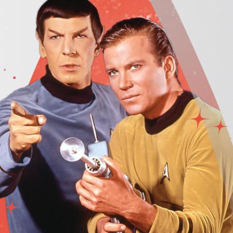 Leonard Nimoy as Spock and William Shatner as Captain Kirk holding a ray gun