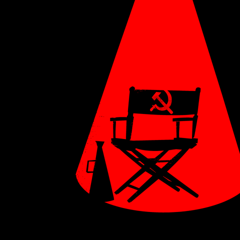 An illustration of a  black background with a red spotlight. In the red spotlight is a director's chair with a hammer and sickle symbol on the chair back. A megaphone sits next to the chair.