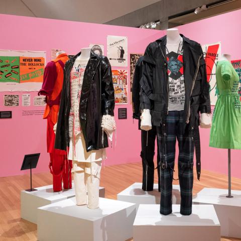 A gallery featuring colorful punk poster and clothing.