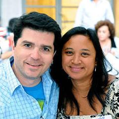 A man and a woman smiling at camera