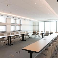 Bergreen Boardroom shoing long desk and chairs in a U-shaped layout