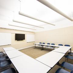 Courtyard Classrooms with conference tables and chairs