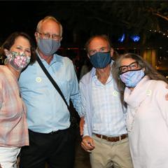 4 people with Covid masks on