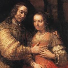A painting showing two figures in an embrace