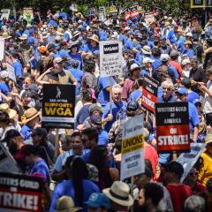 A swarm of picketers take part in the WGA strike on June 21, 2023