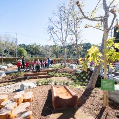 Children walk along the Bloom Garden pathways.