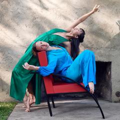 One photo of two dancers in a dance pose, and a photo of four performers with animal puppet masks.